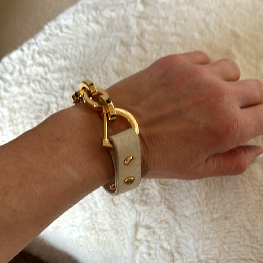 Leather and gold hardware bracelet.